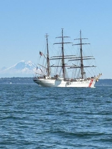 Seattle, Wash – Boat crew members escorting the USCGC Eagle. US Coast Guard photo.