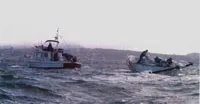 Sailboat under tow
