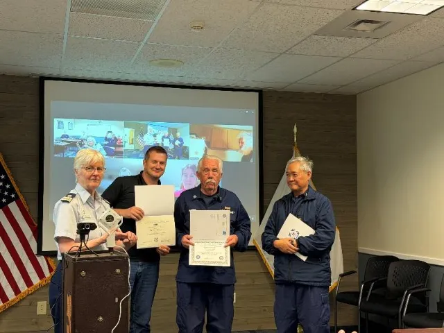 Bellingham, Wash – Flotilla members receive awards. US Coast Guard photo by Mike Hayner.