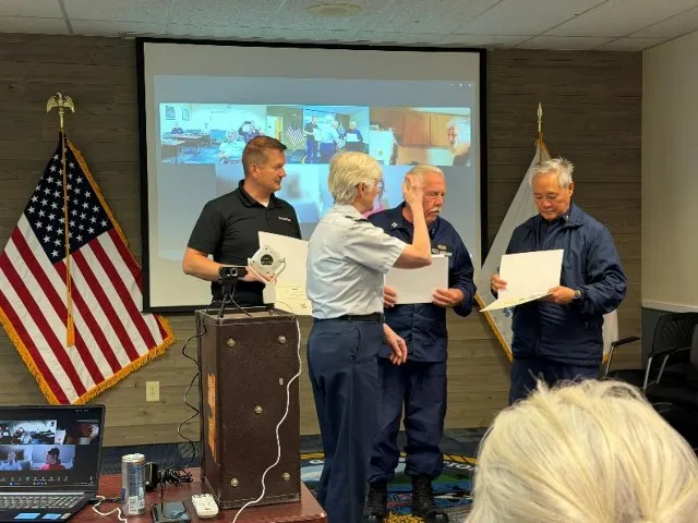 Bellingham, Wash – Flotilla members receive awards. US Coast Guard photo by Mike Hayner.