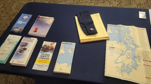 Bellingham, Wash – Auxiliary information table at USCG Band performance. US Coast Guard photo by Ray White.