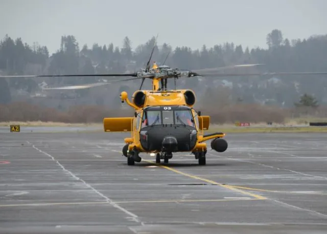 Astoria, OR – An MH-60T Jayhawk in the special yellow livery commemorating 100 years of Coast Guard aviation. US Coast Guard photo.