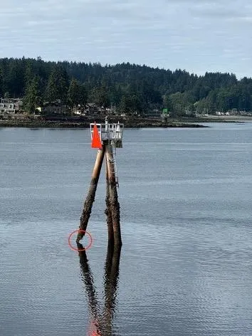 Rich Passage, Wash. — A discrepant aid to navigation, Point White Light, reported by Flotilla 11 Aid Verifiers. U.S. Coast Guard Auxiliary photo.