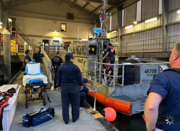 Bellingham, Wash. — Coast Guard Station Bellingham and Bellingham Fire Department crews transfer a survivor to emergency medical services, July 23, 2026. U.S. Coast Guard photo.