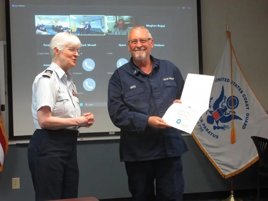 Bellingham, Wash – Members being presented with awards at the Flotilla meeting. US Coast Guard photos by Peter Border.
