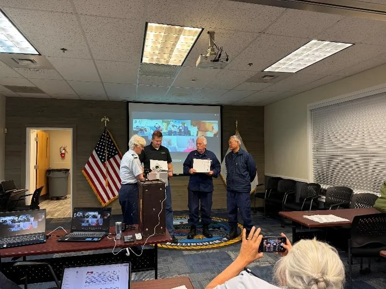Bellingham, Wash – Flotilla members receive awards. US Coast Guard photo by Mike Hayner.
