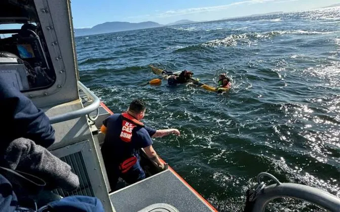 Lummi Island, Wash. – Sta Bellingham boat crew and AS Port Angeles MH-65 crew rescue a family of five and their dog after their kayaks capsized in Rosario Strait, June 9, 2024. US Coast Guard photo.